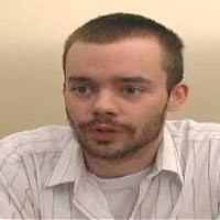 Matt Hooper Man with short brown hair, mustache and beard